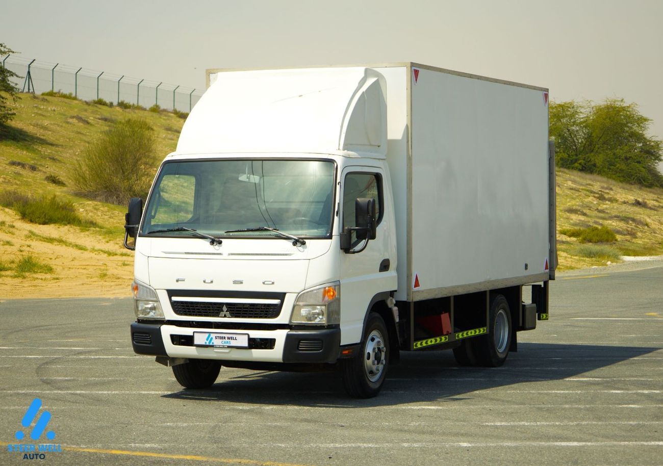 Mitsubishi Fuso Canter 2021 Canter - Short Chassis - Dry Box with Tail Lift - Diesel M/T - GCC - Book Now!