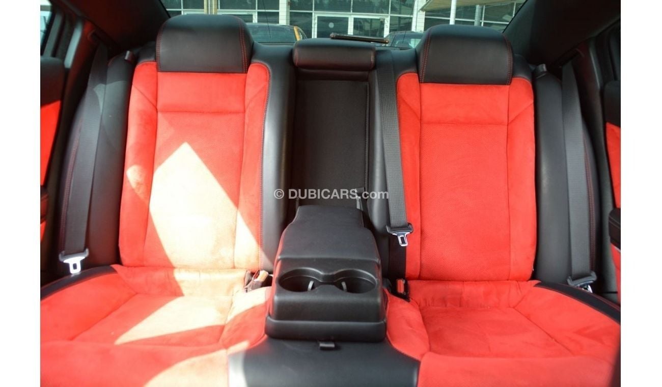 Dodge Charger R/T The Charger RT is powered by a 5.7-liter HEMI V8 engine that produces 370 horsepower and 535 Nm