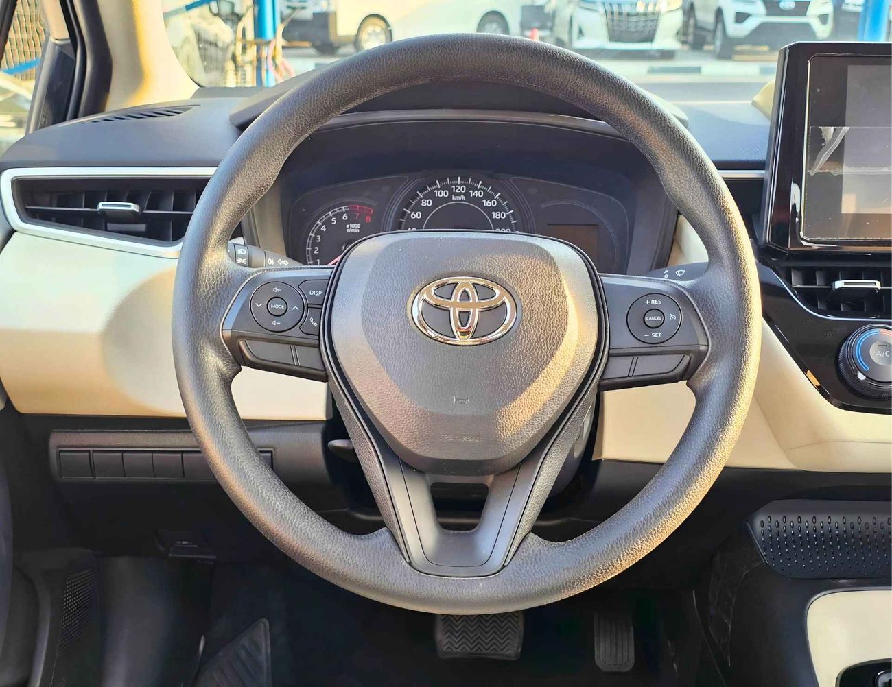 Toyota Corolla XLI E / 1.6L V4 PETROL / DVD / REAR A/C (CODE # XLI)