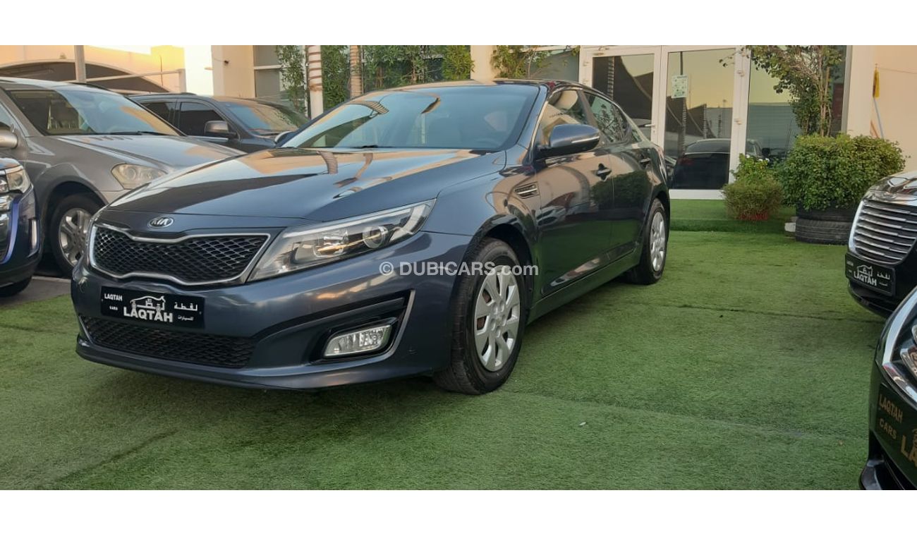 كيا أوبتيما خليجى رقم 2  شاشة   كاميرا  مثبت  سرعة  جناح خلفى رنجات حساسات أنوار ضباب بحالة ممتازة