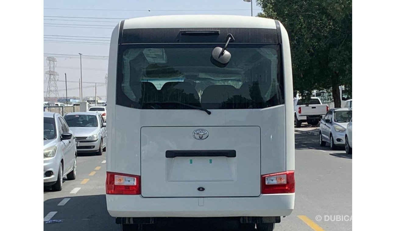 تويوتا كوستر 4.2L Diesel 22 seater Full Option Automatic door