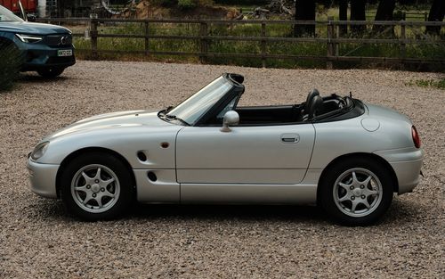 Suzuki Cappuccino exterior - Side Profile