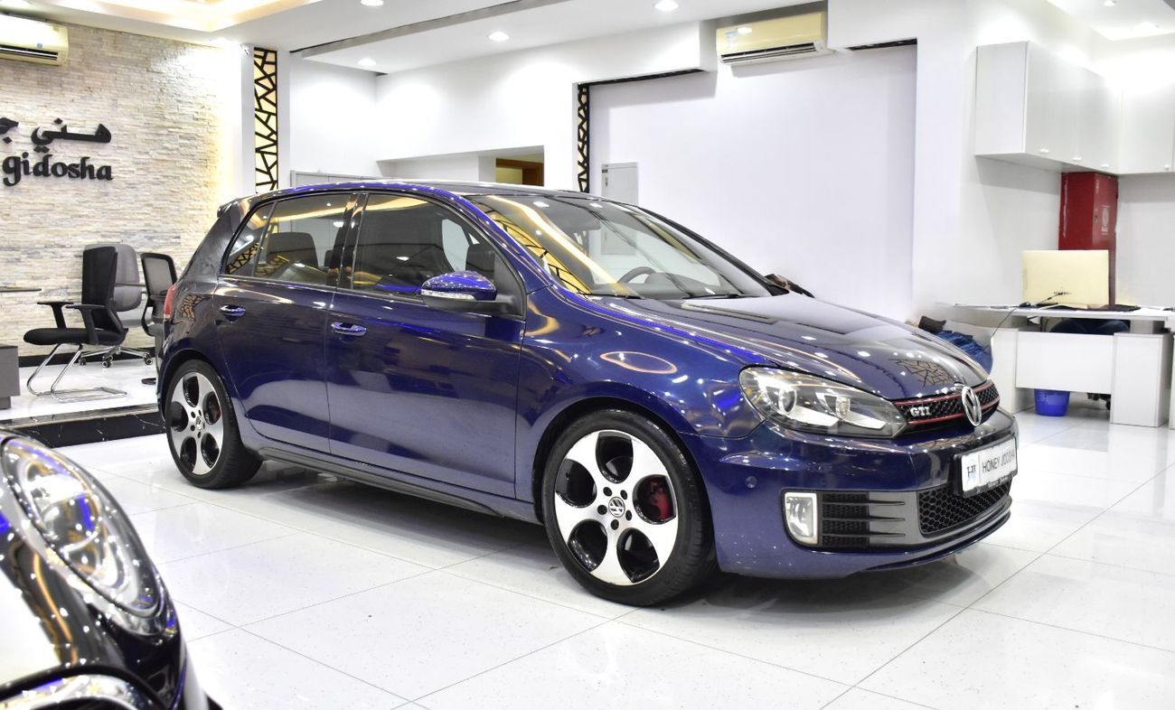Volkswagen Golf GTI EXCELLENT DEAL for our Volkswagen GTi ( 2013 Model ) in Blue Color GCC Specs
