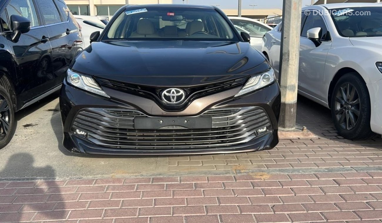 Toyota Camry 2020 GCC model, agency dye, brown color, beige interior, leather hatch, alloy wheels, mirror sensors