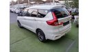 Suzuki Ertiga Gulf model 2019 paint agency 1600 cc white color imprint rear wing in excellent condition