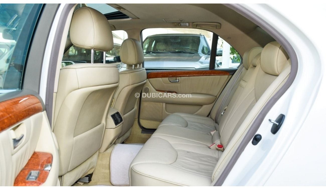 Lexus LS 430 Imported 1/2 Ultra, model 2006, white color, leather opening, wooden wheels, electric mirrors, excel