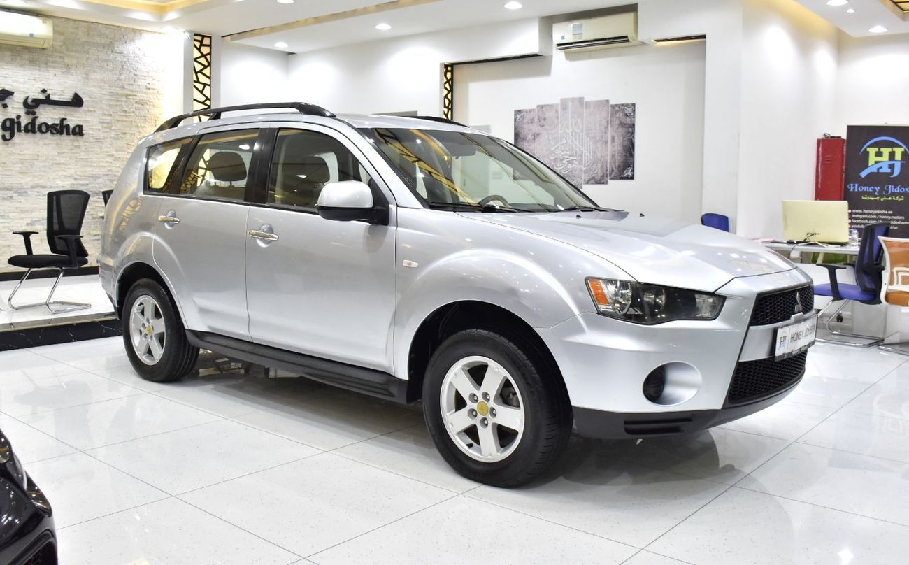 Mitsubishi Outlander EXCELLENT DEAL for our Mitsubishi Outlander 4WD ( 2012 Model ) in Silver Color GCC Specs