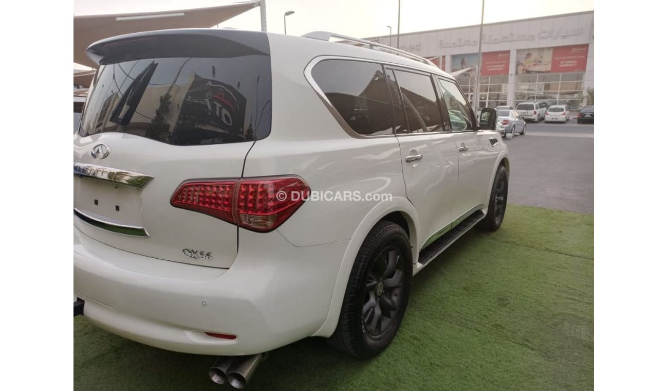 Infiniti QX56 Model 2011 imported, white color, leather opening, alloy wheels, sensors, speed stabilizer, in excel