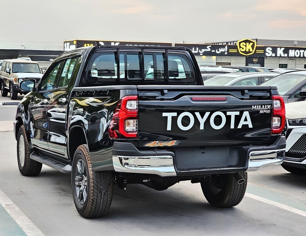 Toyota Hilux TOYOTA HILUX SR5 WIDE BODY DOUBLE CABIN || 2.7L PETROL A/T 4WD | BSM, WINOW VISOR, FOG LIGHTS, WOOD