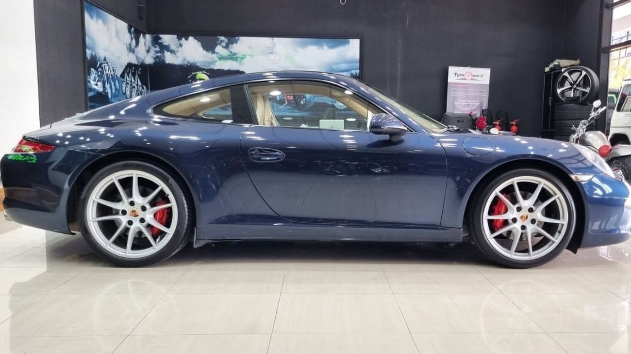 بورش 911 CARRERA PORSCHE CARRERA 2013 GCC WITH 68K KM FULL PORSCHE SERVICE HISTORY IN GOOD CONDITION FOR 220K AED