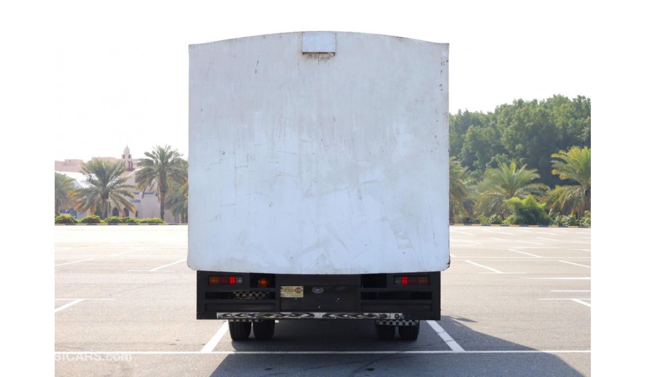 Mitsubishi Fuso Canter Water Body with Sliding Door Long Chassis 4Ton - Japan Manufactured | GCC