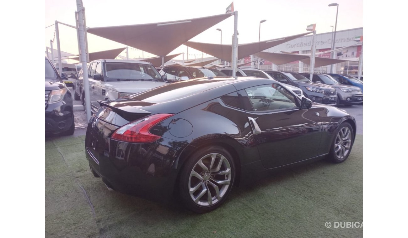 نيسان 370Z موديل 2013 وارد كوبيه بصمة مثبت سرعة تحكم رنجات حساسات جلد بحالة ممتازة