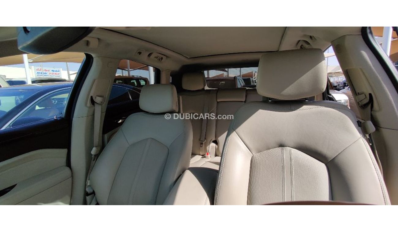 Cadillac SRX 2014 model GCC specs full options panorama clean car 3.6ltr