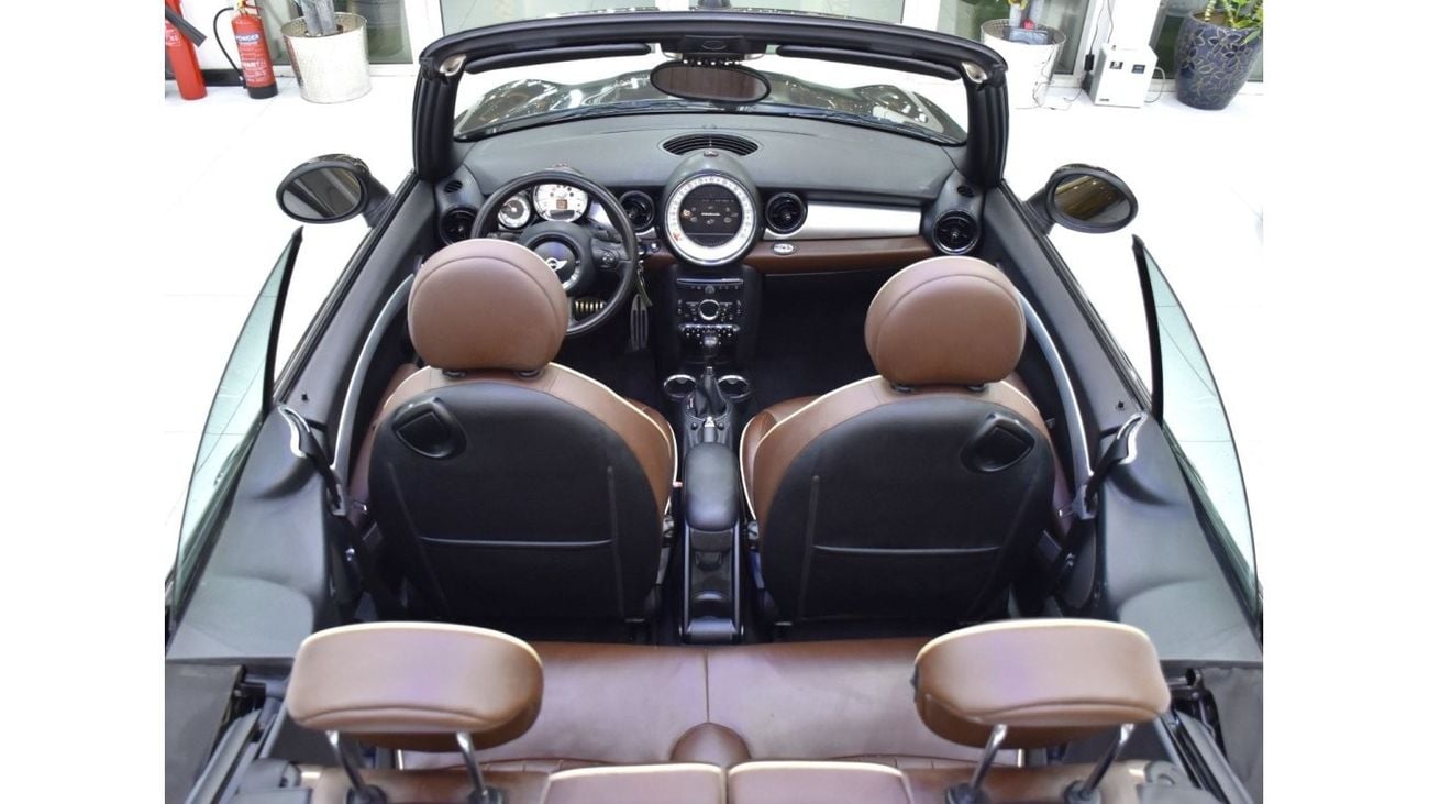 Mini Cooper S EXCELLENT DEAL for our Mini Cooper S Convertible ( 2011 Model ) in Brown Color GCC Specs