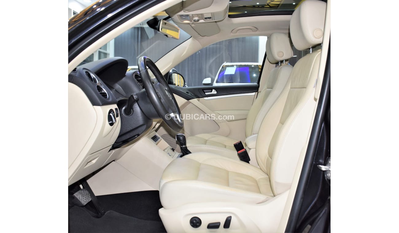 Volkswagen Tiguan SEL EXCELLENT DEAL for our Volkswagen Tiguan 2.0 TSi 4Motion ( 2014 Model! ) in Black Color! GCC Spe