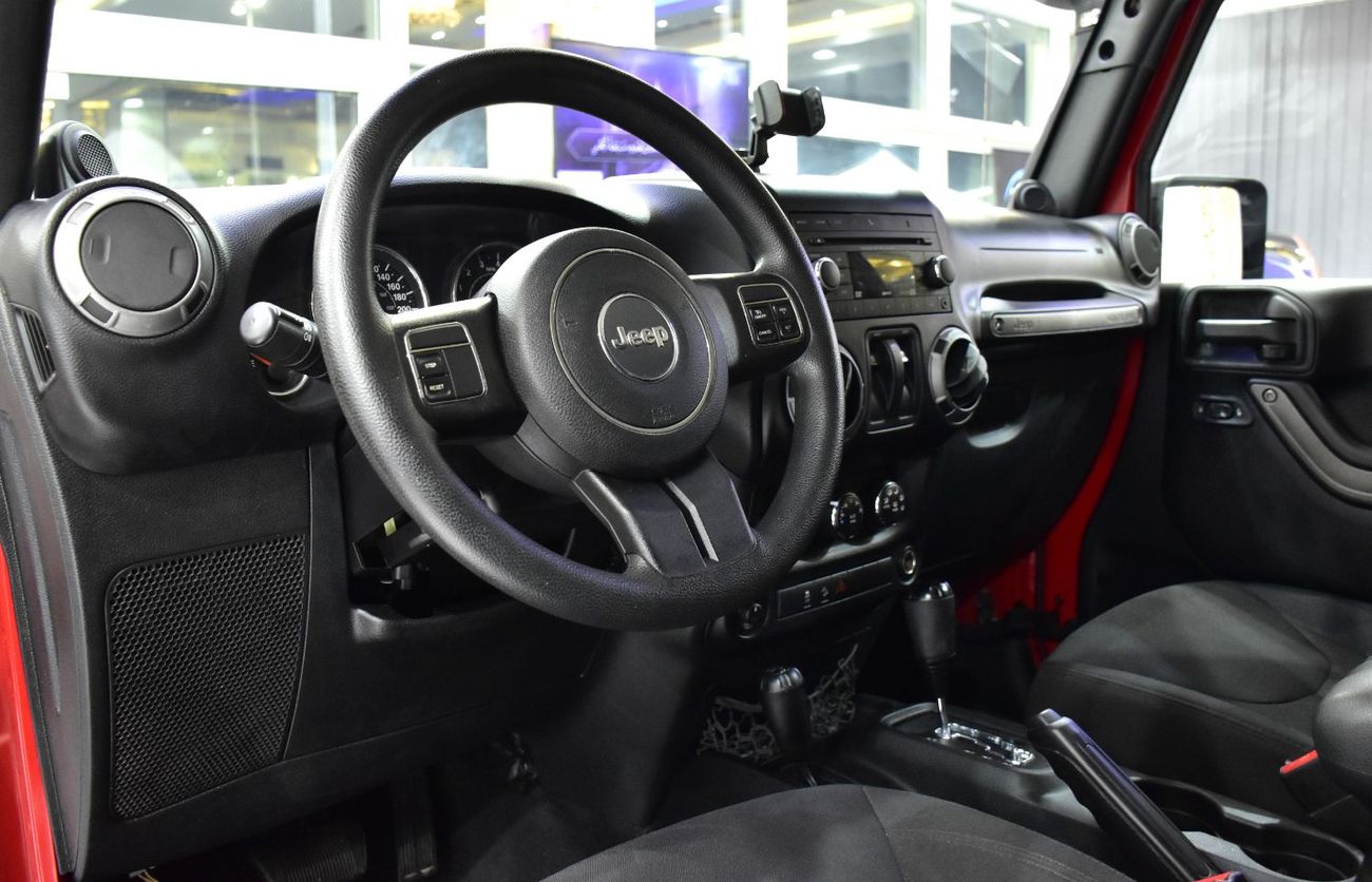 Jeep Wrangler EXCELLENT DEAL for our Jeep Wrangler Sport ( 2014 Model ) in Red Color GCC Specs