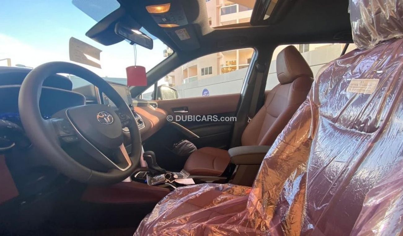 Toyota Corolla Cross Full option 2023 Limited Hybrid FWD 1.8L petrol only  For UAE. Ready for Delivery