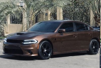 Dodge Charger Unleash pure muscle with this Dodge Charger 2017, upgraded with an SRT body kit for an aggressive, h