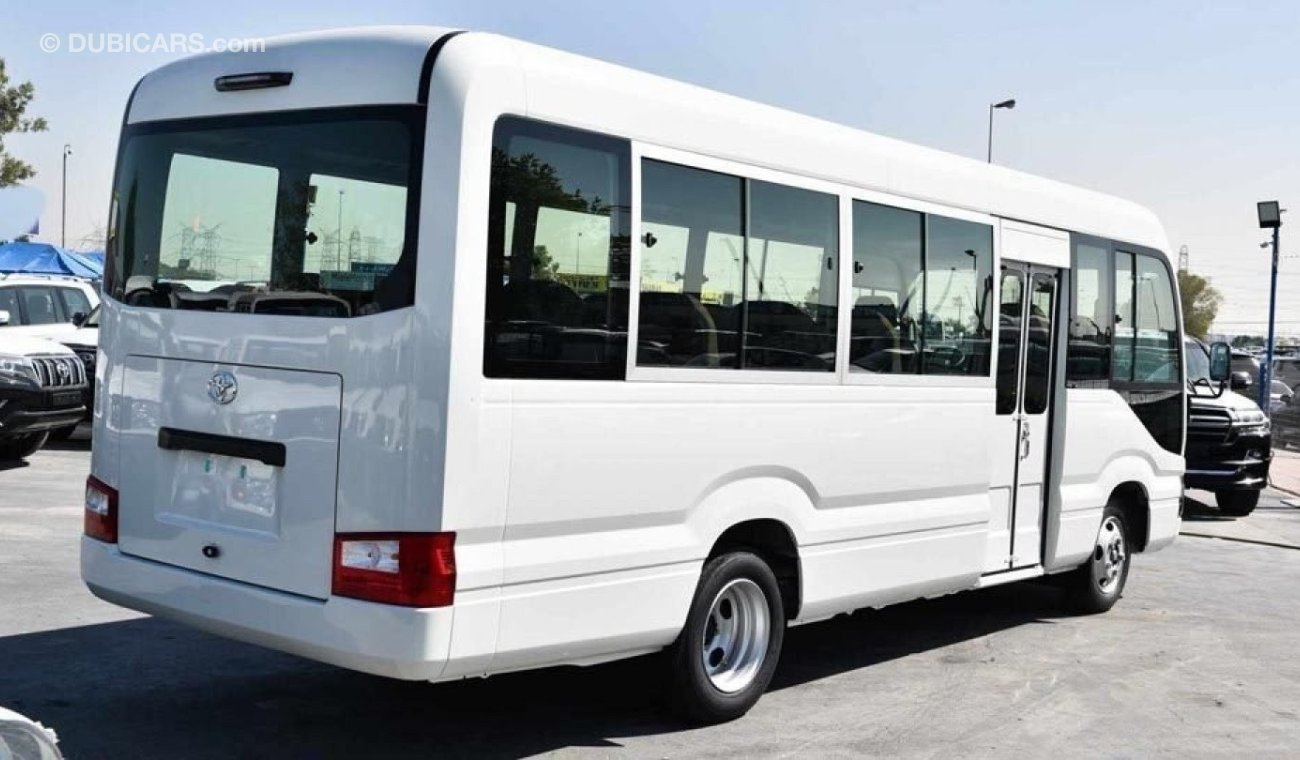 Toyota Coaster 4.2L DSL M/T 30 SEATER AUTO DOOR