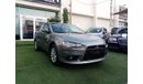 Mitsubishi Lancer Gulf gray color, inside beige without accidents, rear wing sensors, fog lights, in excellent conditi