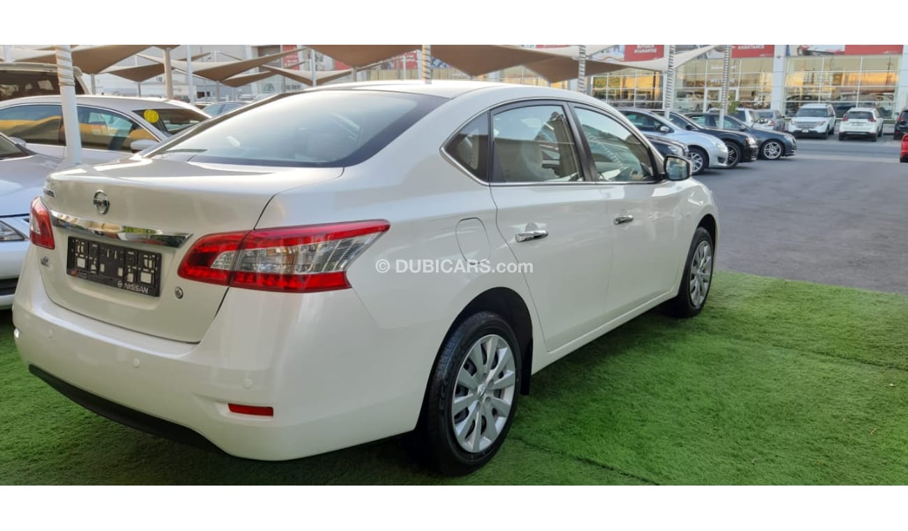 Nissan Sentra Gulf - agency condition - white paint inside beige in excellent condition, you do not need any expen