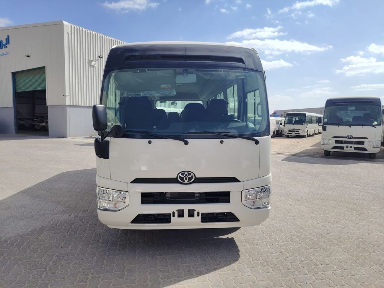 Toyota Coaster 2025 TOYOTA COASTER HIROOF 2.8L DIESEL A/T 22 SEATER LUGGAGE RACK BRAND NEW 0KM