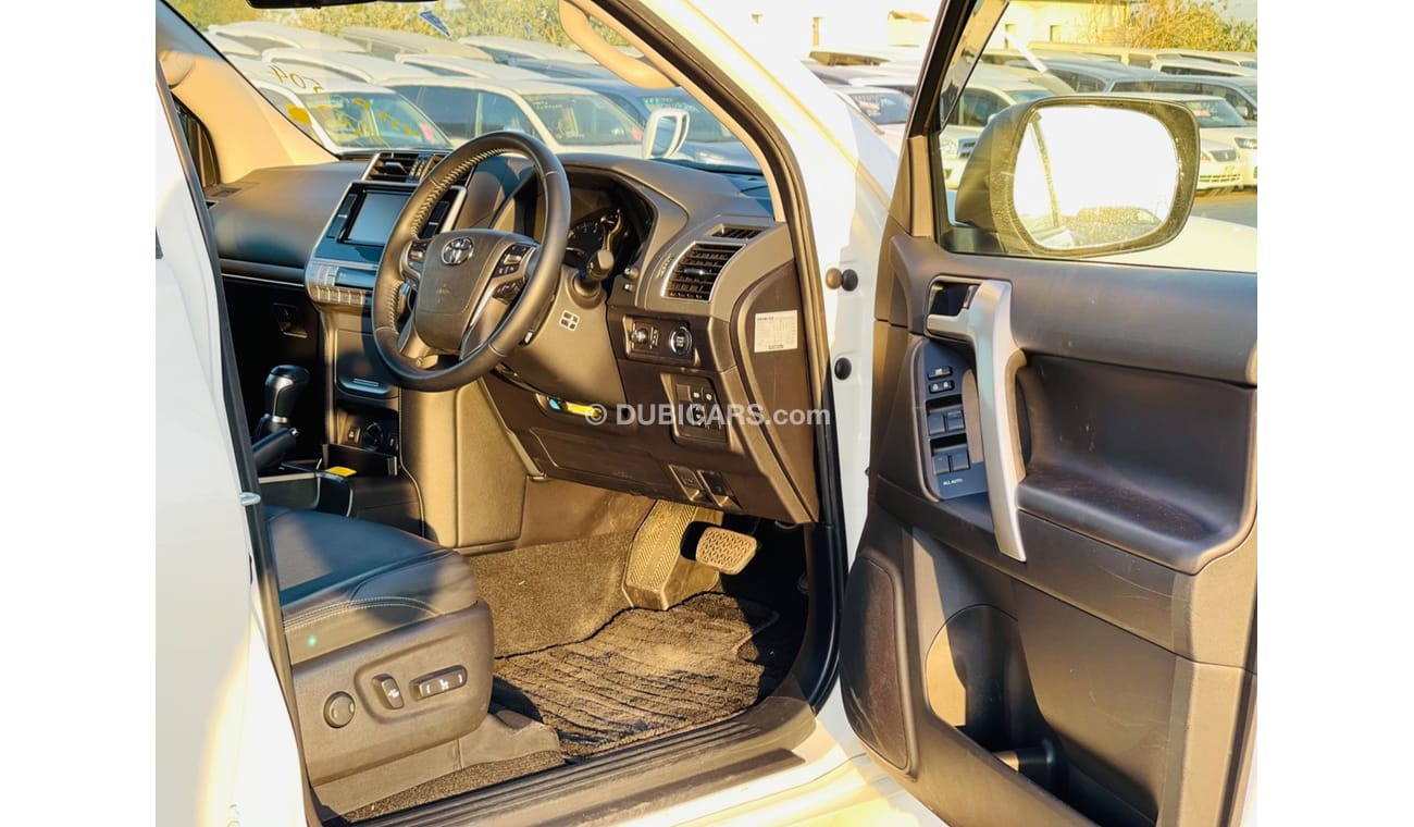 Toyota Prado Toyota prado Petrol  engine 2.7 model 2018 from japan white color 7 seater car very clean and good c