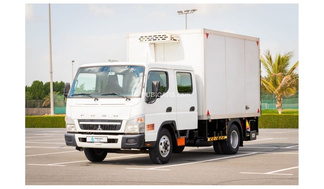 ميتسوبيشي فوسو كانتير 2017 Dual Cabin with Carrier Chiller - Tail lift DSL M/T - Low Mileage - GCC Specs
