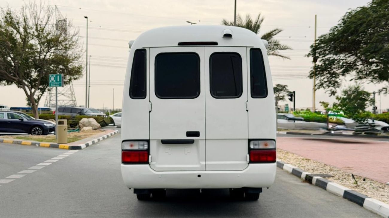 Toyota Coaster Fully luxury seats fully covered by cameras