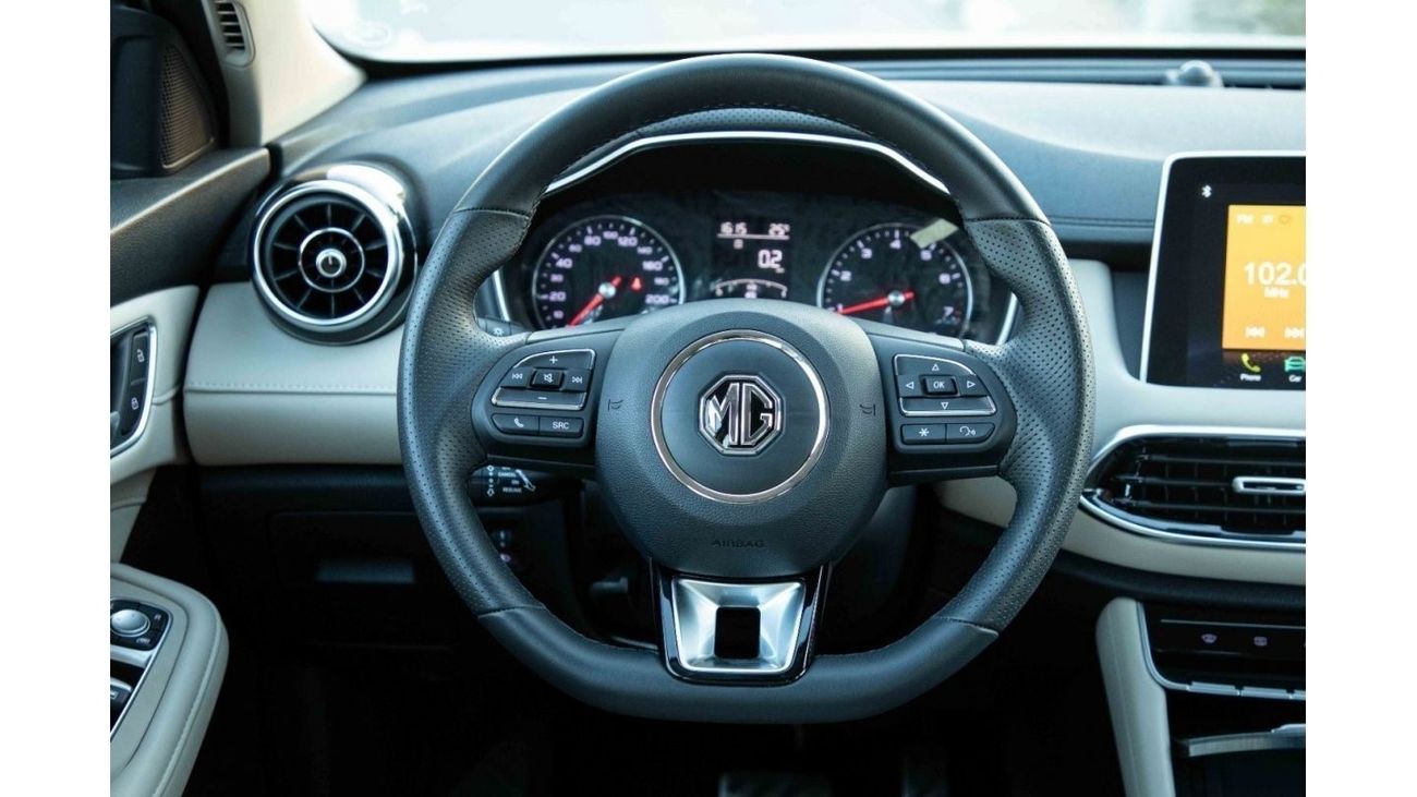 أم جي HS 2023 إم جي HS 4X4 2.0T LUXURY - أبيض لؤلؤي من الداخل بني | سعر التصدير