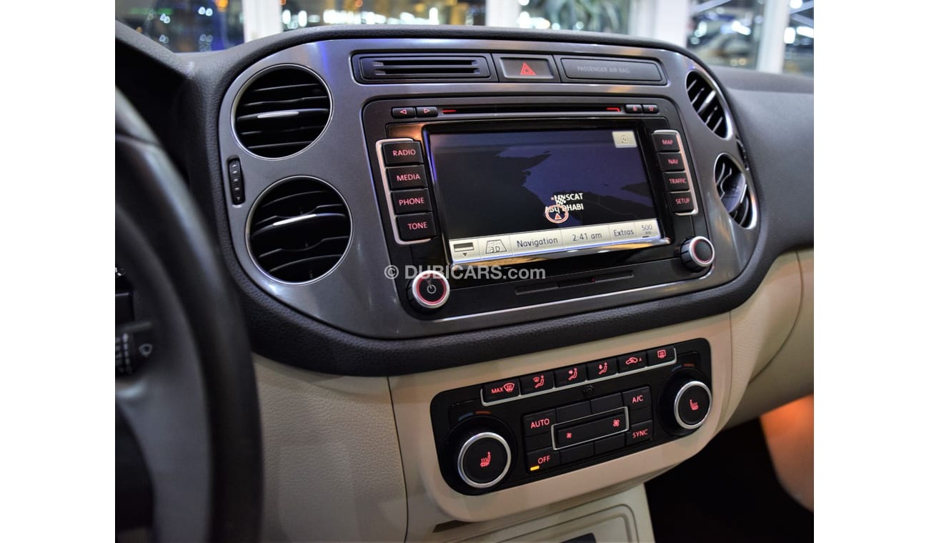 Volkswagen Tiguan SEL EXCELLENT DEAL for our Volkswagen Tiguan 2.0 TSi 4Motion ( 2014 Model! ) in Black Color! GCC Spe