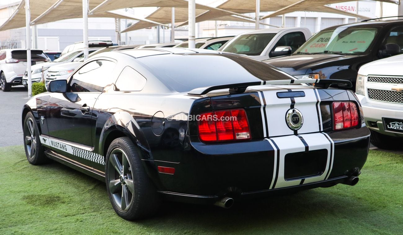 فورد موستانج خليجى كوبيه موديل 2009 لون أسود بحالة ممتازة لاتحتاج لأى مصاريف