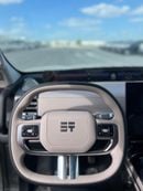 Jetour G700 2.0L Turbo engine with dual electric motors, delivering a combined 724 horsepower and 795 Nm torque,