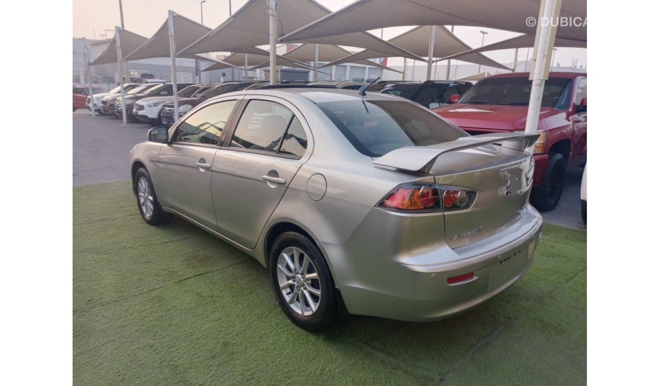 Mitsubishi Lancer Gulf 1600 CC, 2016 model, without accidents, automatic rear spoiG