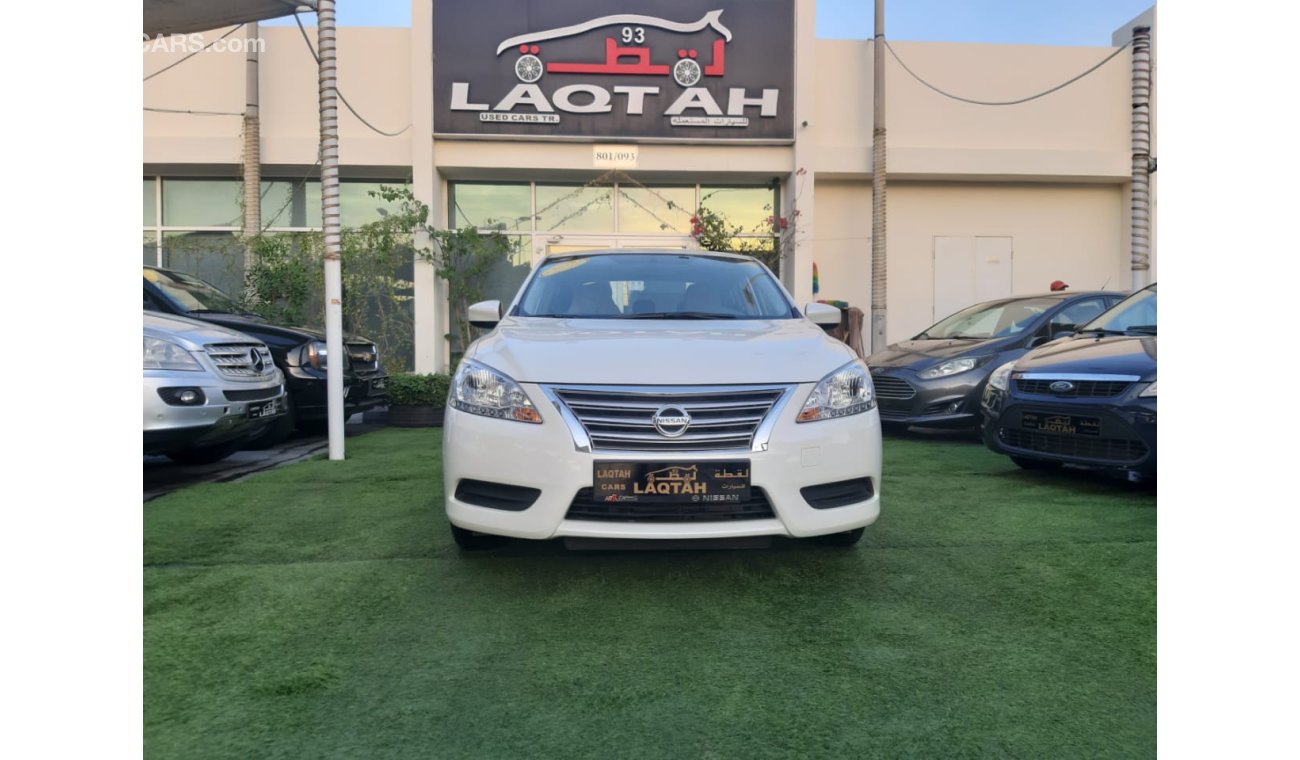 Nissan Sentra Gulf - agency condition - white paint inside beige in excellent condition, you do not need any expen