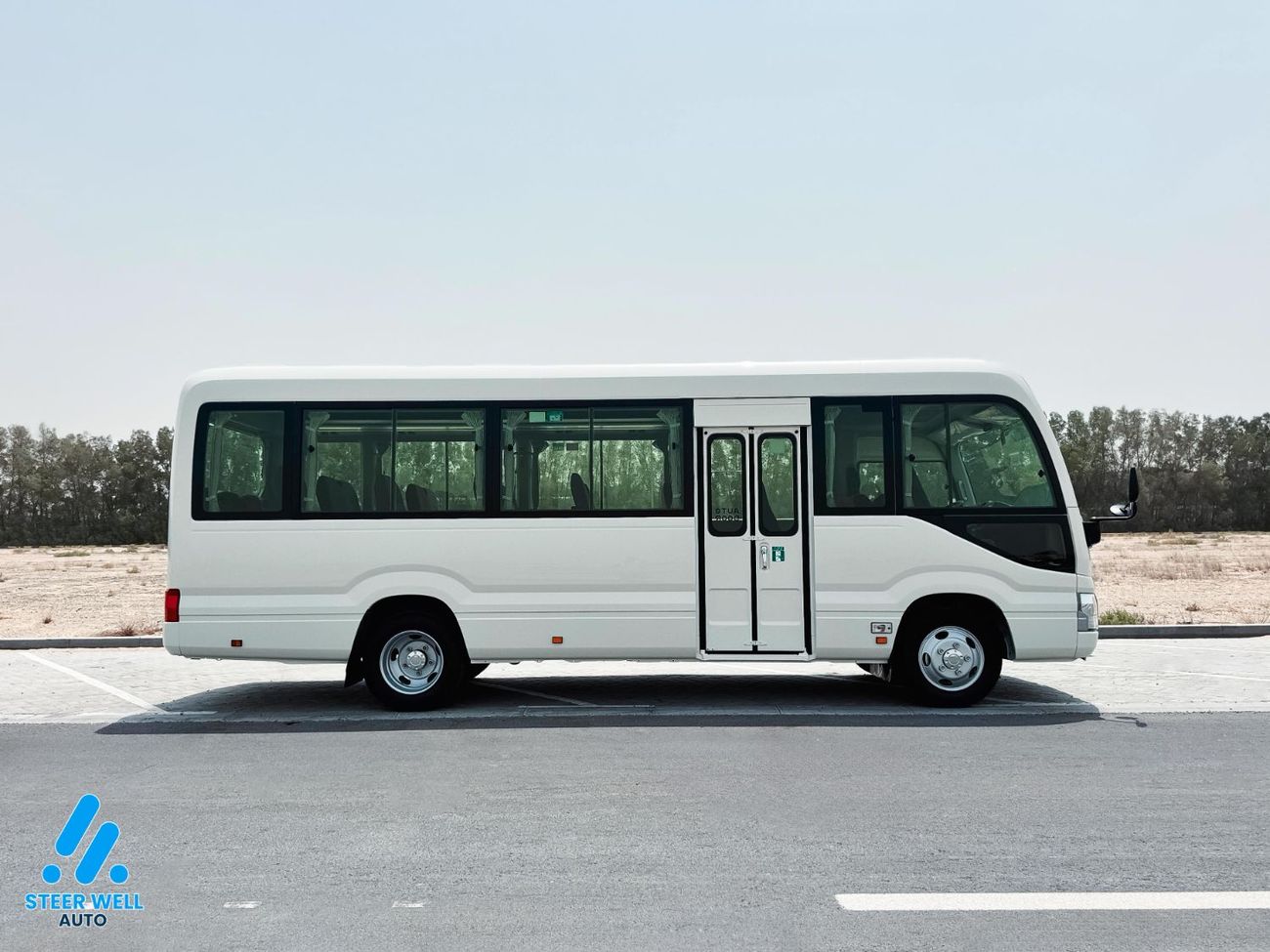 Toyota Coaster 23-Seater Bus 4.0L Diesel RWD GCC Specs Full Option White