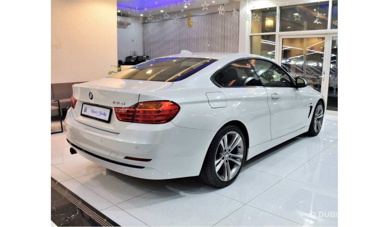 BMW 420i EXCELLENT DEAL for our BMW 420i Sport ( 435i Badge ) ( 2015 Model! ) in White Color! GCC Specs