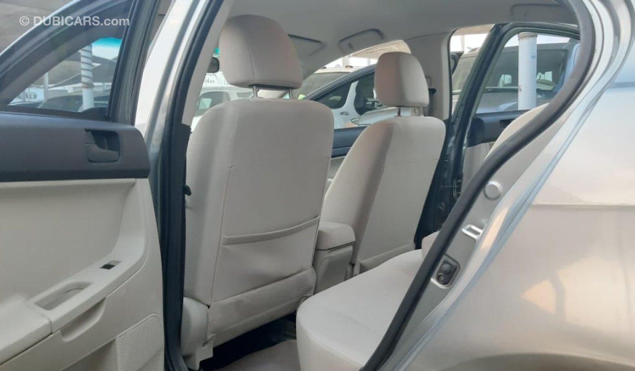 Mitsubishi Lancer Mitsubishi Lancer Gulf 2015 model gray color inside beige without accidents alloy wheels rear wing s