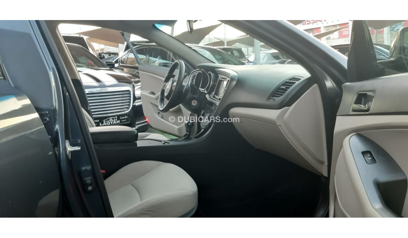 كيا أوبتيما خليجى رقم 2  شاشة   كاميرا  مثبت  سرعة  جناح خلفى رنجات حساسات أنوار ضباب بحالة ممتازة