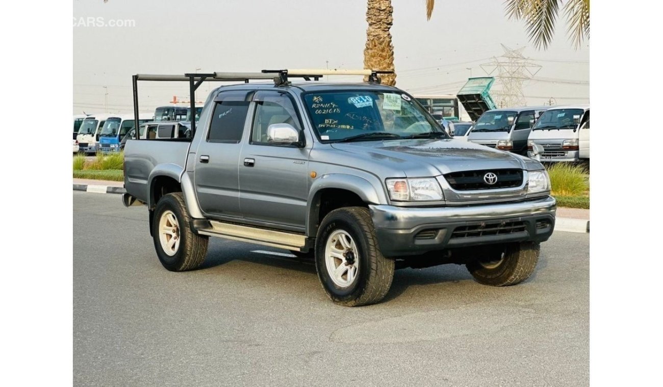 Toyota Hilux 2002 | PETROL AT 2.7L V4 [ROOF RACK] (KEY START) SIDE STEPS | VERY CLEAN VEHICLE | GOOD CONDITION