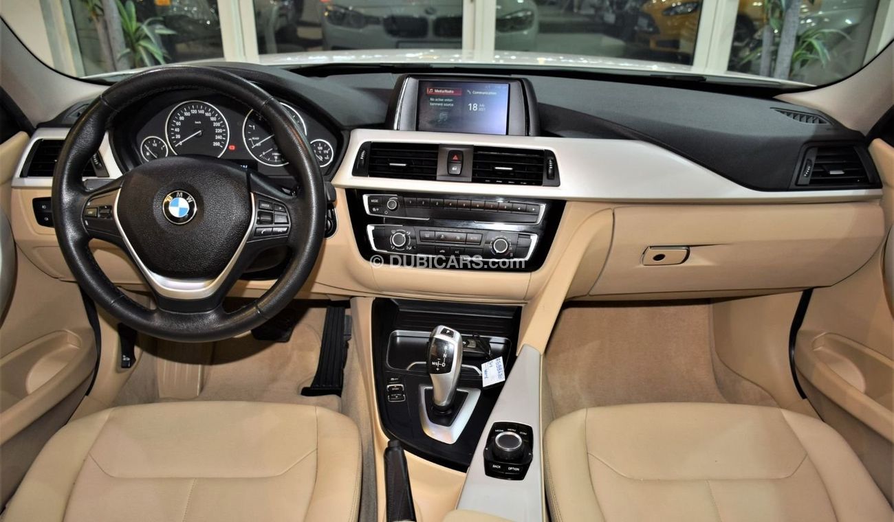 BMW 318i EXCELLENT DEAL for our BMW 318 i ( 2018 Model ) in White Color GCC Specs