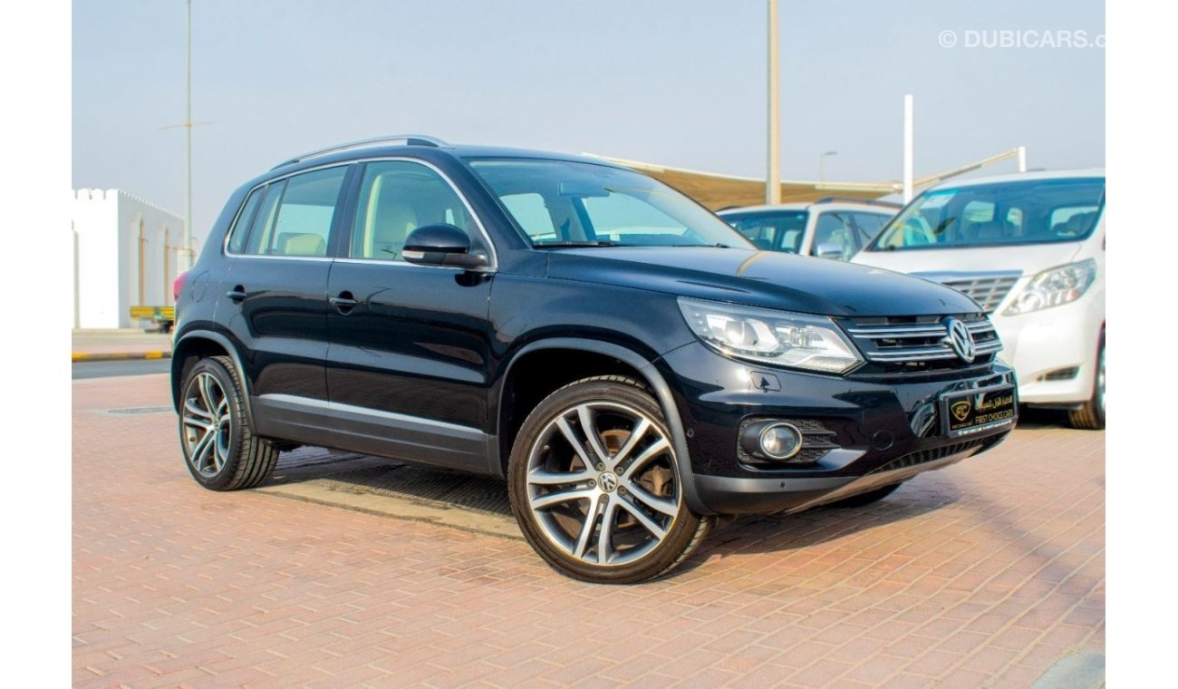 فولكس واجن تيجوان 2015 | VOLKSWAGEN TIGUAN | 2.0L SEL TSI 4 MOTION V4 5-DOORS | AUTOMATIC TRANSMISSION | GCC | VERY WE