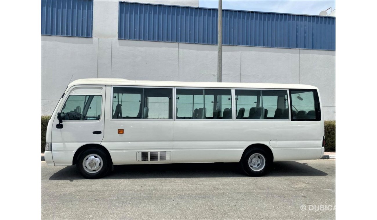 Toyota Coaster Toyota Coaster 2009 gulf space 30 seats , petrol accident free