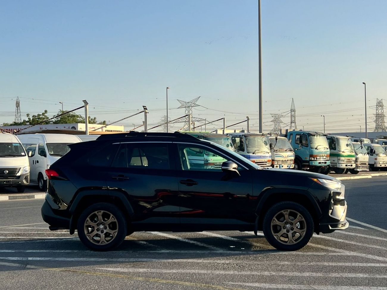 تويوتا راف ٤ 2023 Toyota RAV4 Hybrid Wood Land Edition 2.5L V4 - AWD 4x4 - Rear Camera - Leather Seats