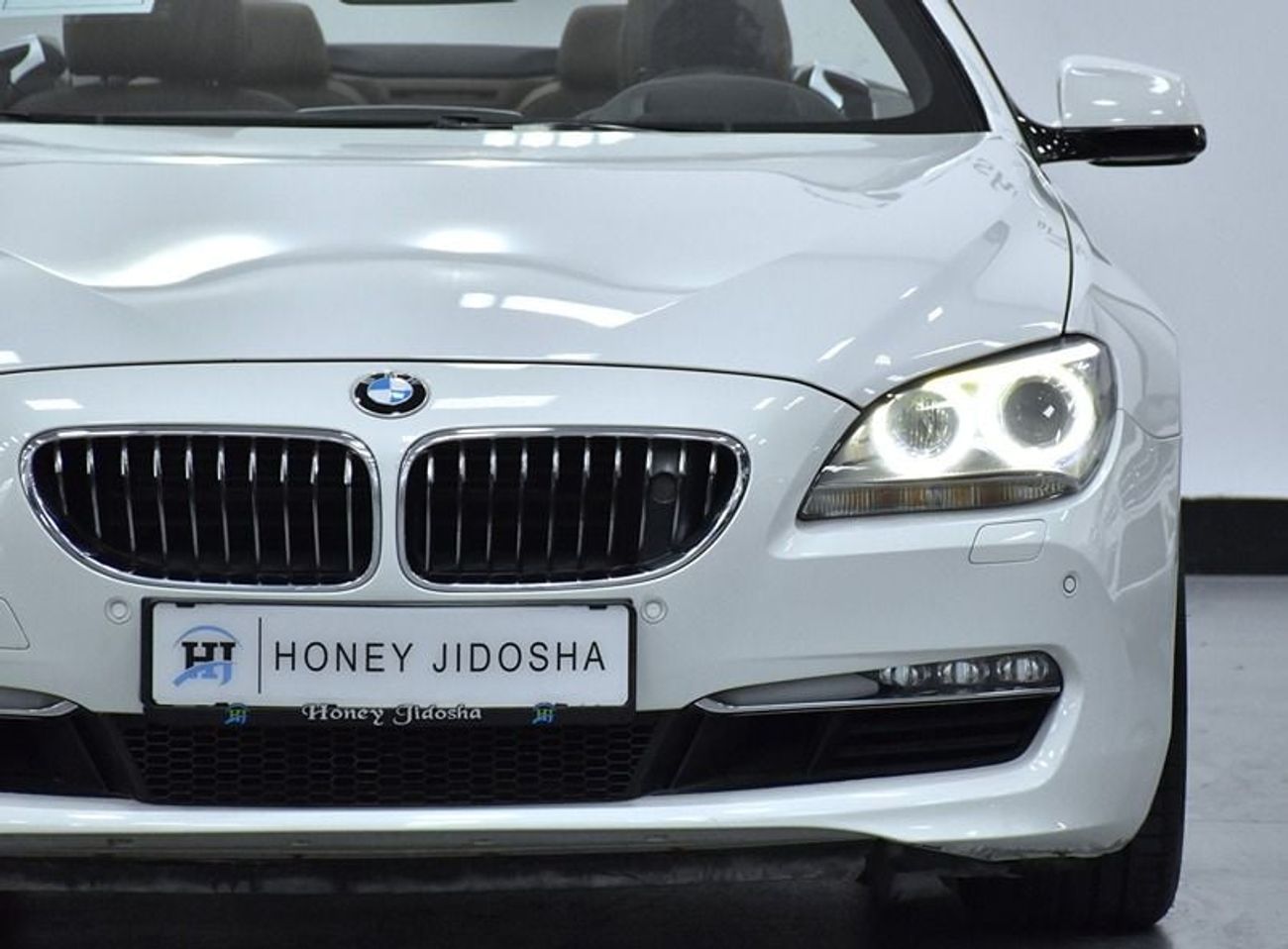 BMW 650i EXCELLENT DEAL for our BMW 650i CONVERTIBLE ( 2011 Model ) in White Color GCC Specs