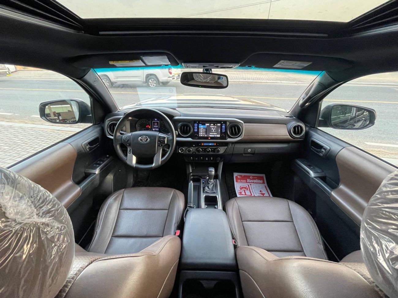 تويوتا تاكوما طقم TRD / محرك V6 سعة 3.5 لتر / دفع رباعي / فتحة سقف / شاشة كبيرة / نظام مراقبة النقاط العمياء / بحا