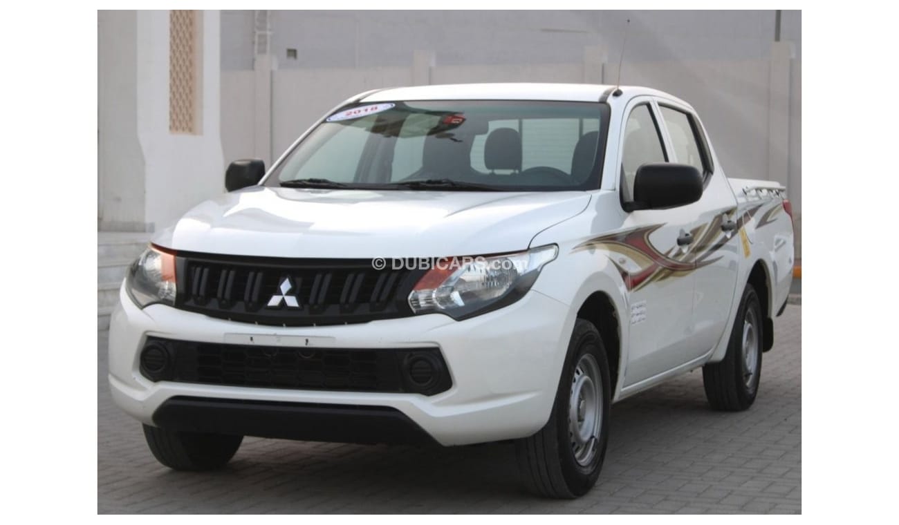 ميتسوبيشي L200 متسوبيشي ال200 ابيض  خليجي 2018 بحالة ممتازة بدون حوادث