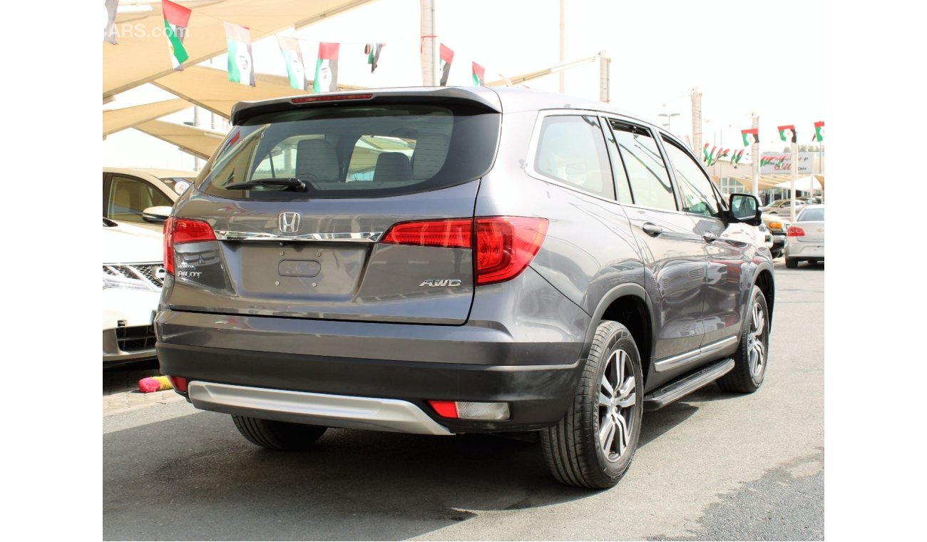 Honda Pilot Touring FULL OPTION  - GCC - EXCELLENT CONDITION INSIDE OUT - ACCIDENTS FREE