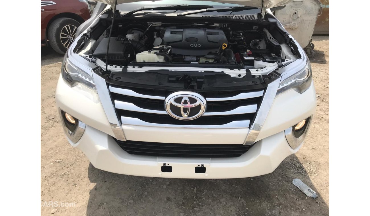 Toyota Fortuner diesel white color 2015 model full option 7 seats automatic 2.8L