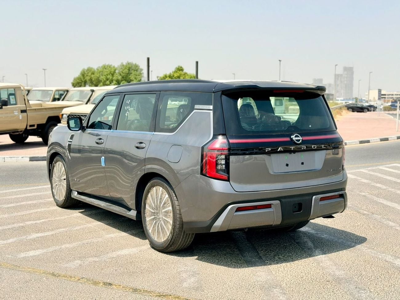 Nissan Patrol LE PLATINUM CITY 2026 NISSAN PATROL 3.5T Platinum - Grey / Red